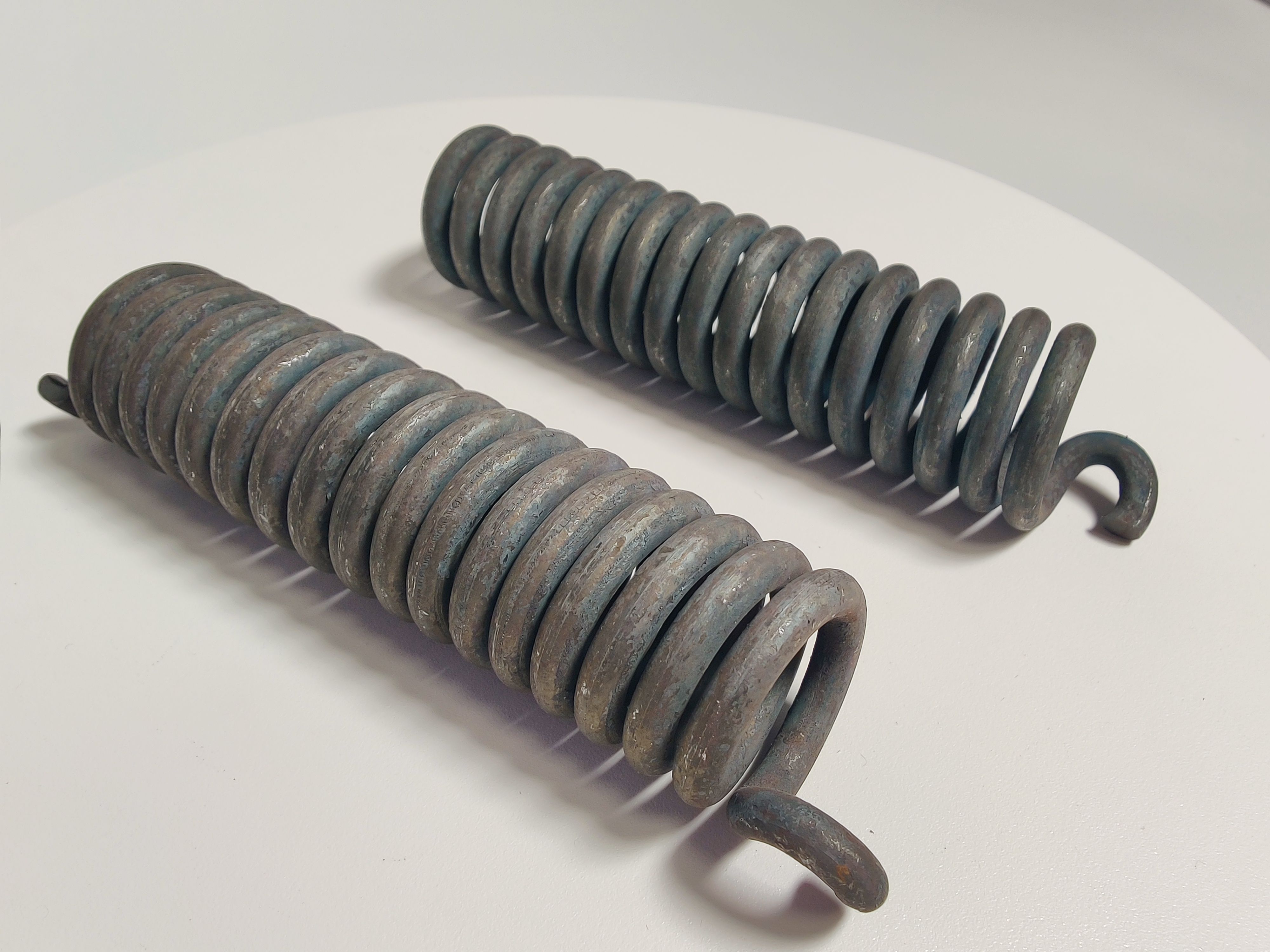 Пружина КПЭМ Абат (левая, правая - комплект 2шт) код 7223,7224 (КПЭМ, ЭСК)