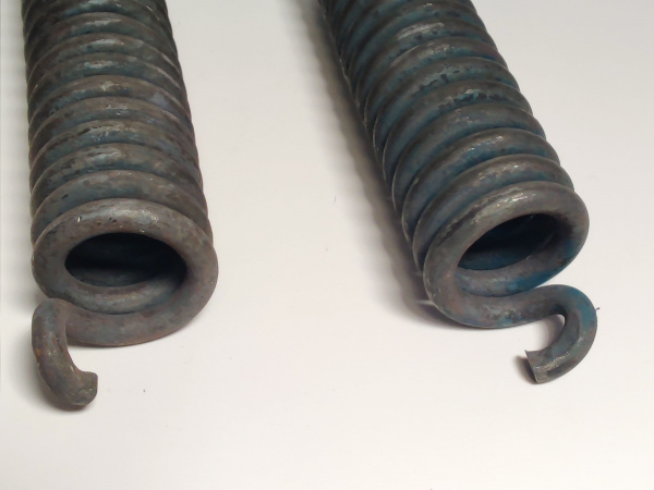 Пружина КПЭМ Абат (левая, правая - комплект 2шт) код 7223,7224 (КПЭМ, ЭСК)